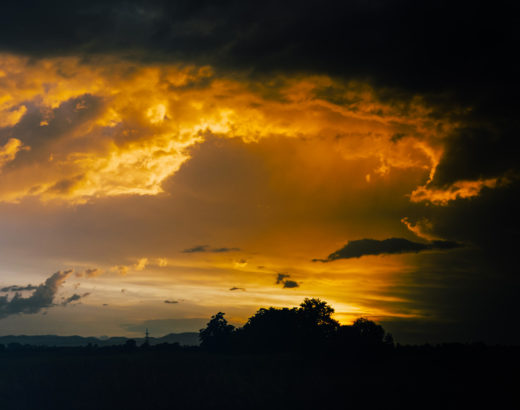 orange clouds in a black sky