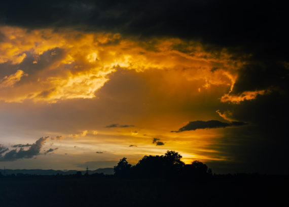 orange clouds in a black sky
