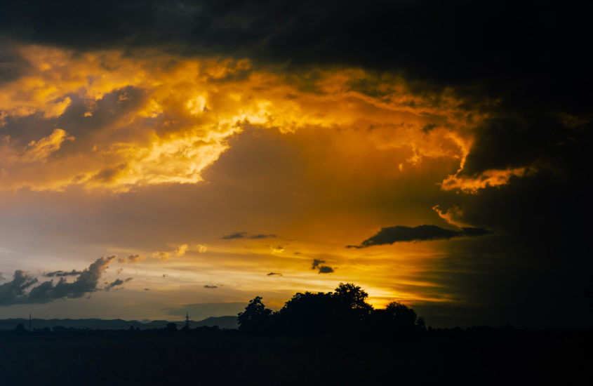 orange clouds in a black sky