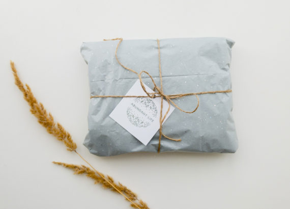 A gift wrapped in paper and tied with string